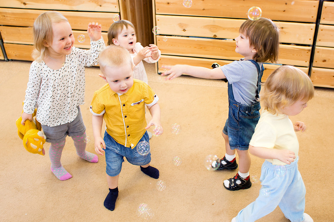 Kids are playing with each other in Little Scholars Academy