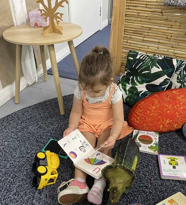 Small girl is learning new language in Little Scholars Academy